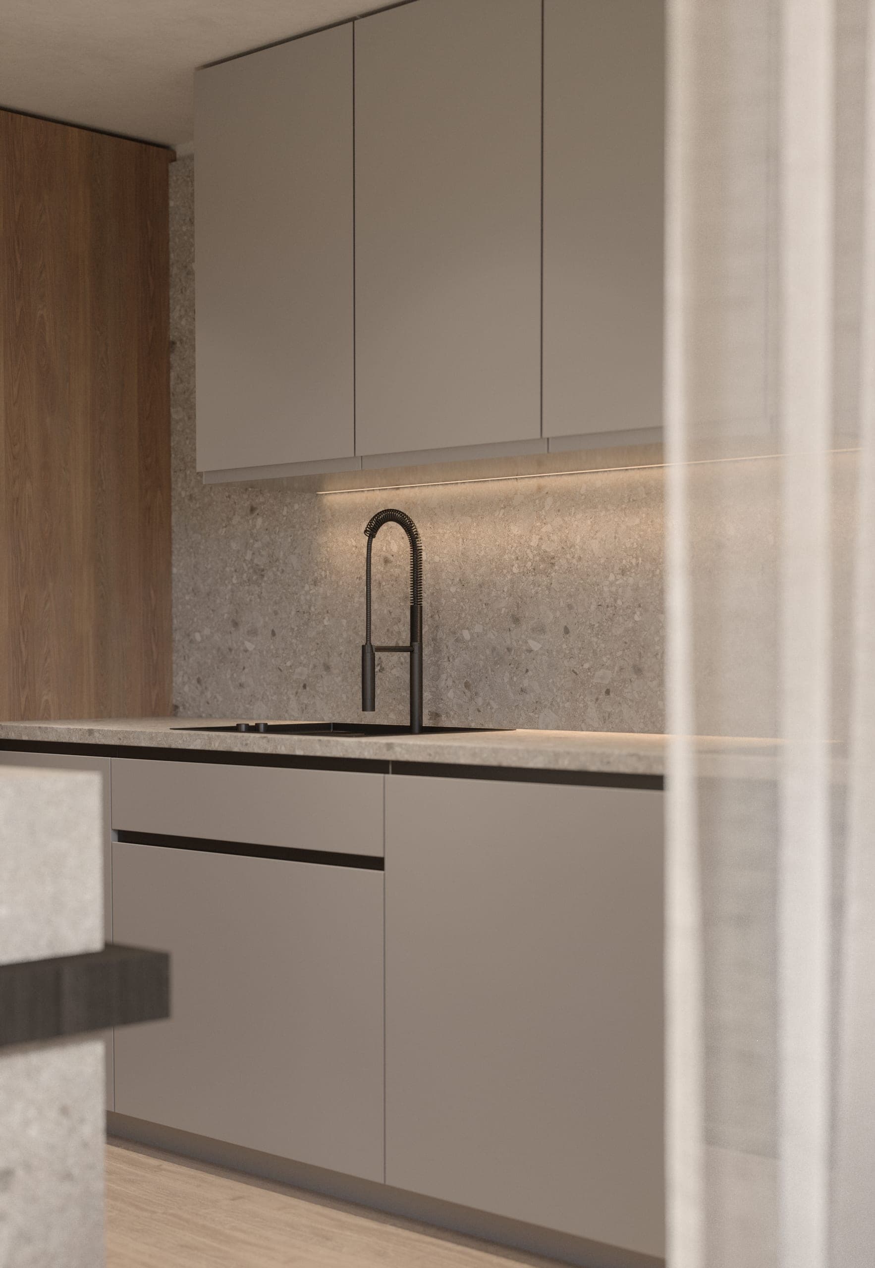 Băneasa House: kitchen with handleless cabinets, a stone worktop and a black tap, seen past a sheer curtain