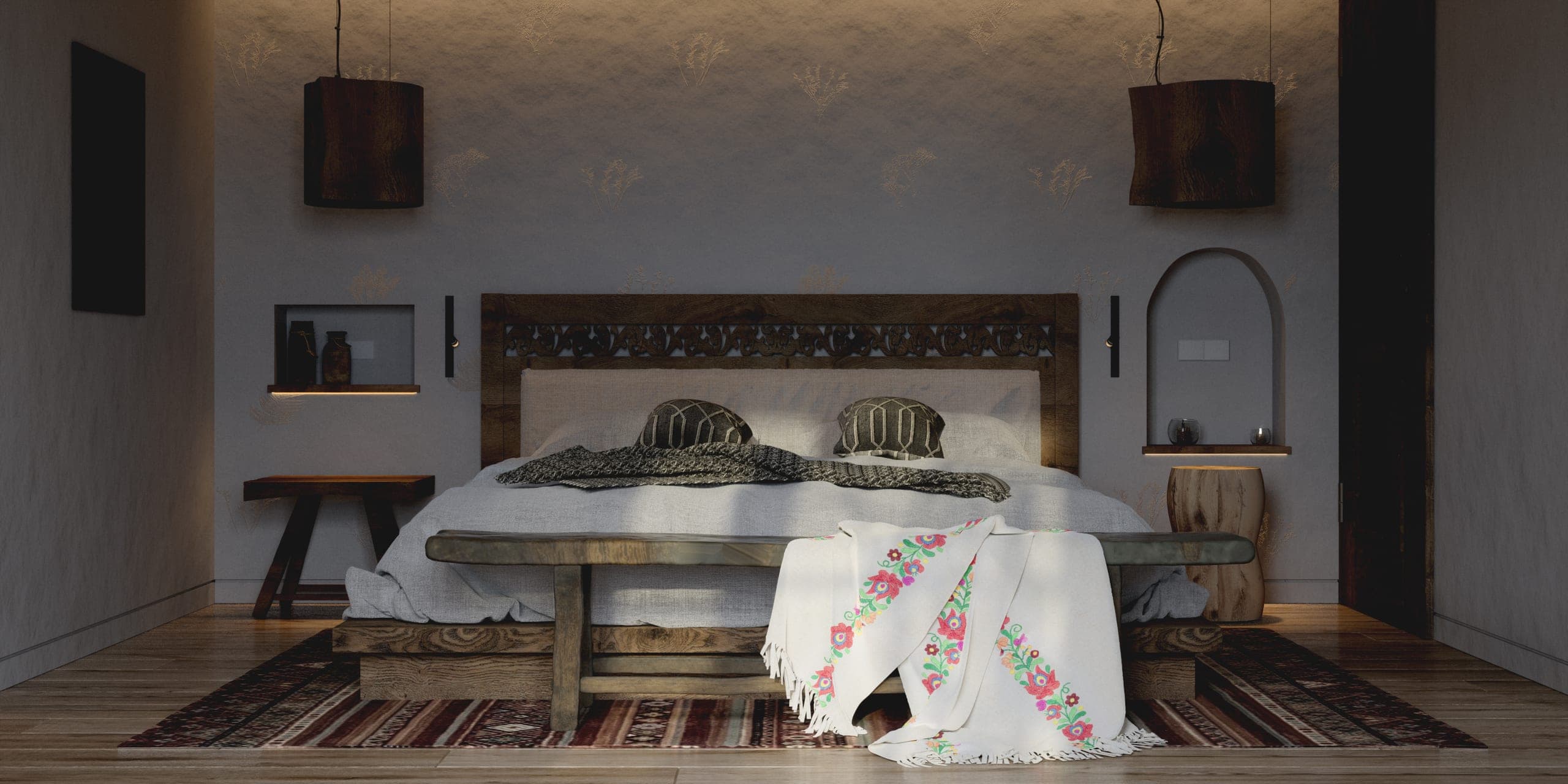Matca guest room: bed with a carved headboard, embroidered throw and patterned rug