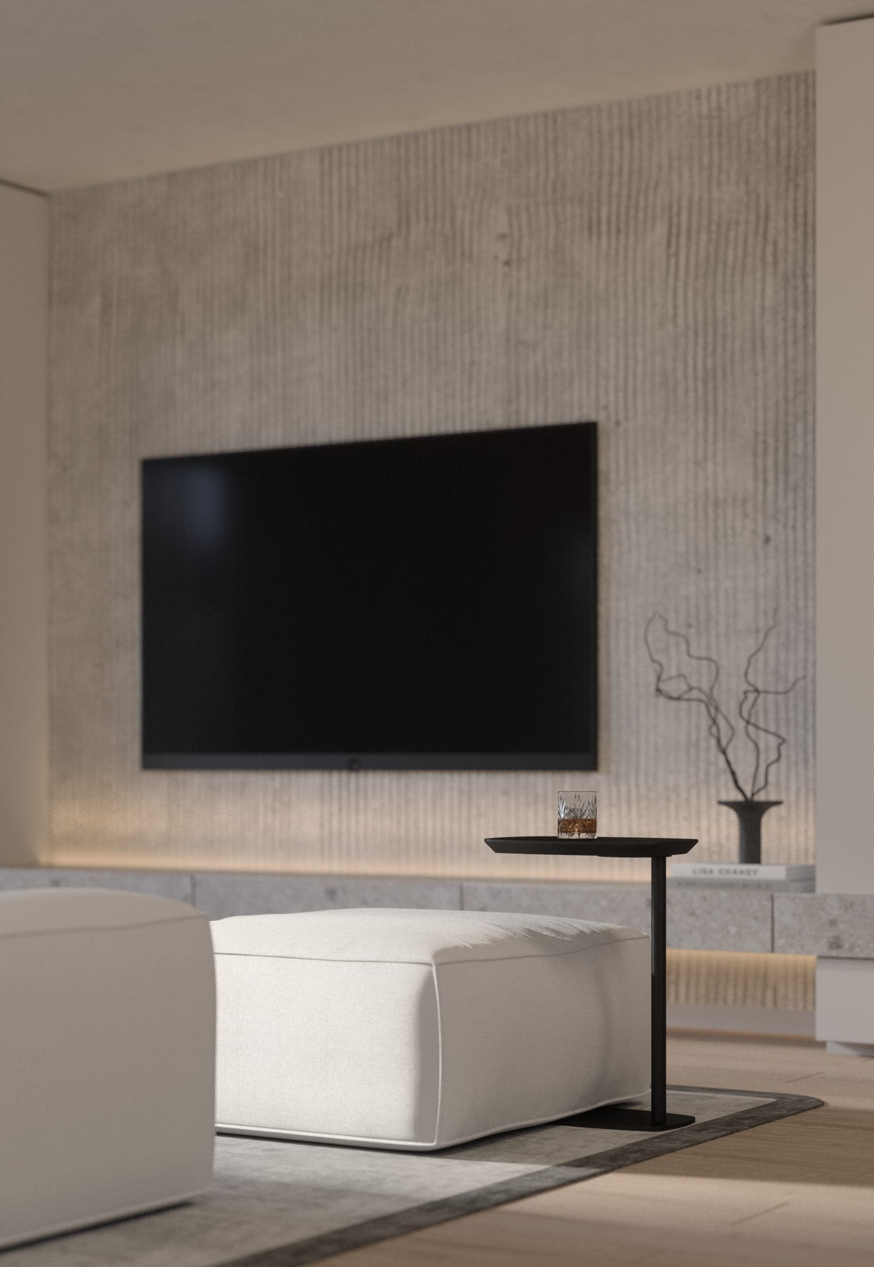 Băneasa House: television wall in textured plaster with a low white ottoman