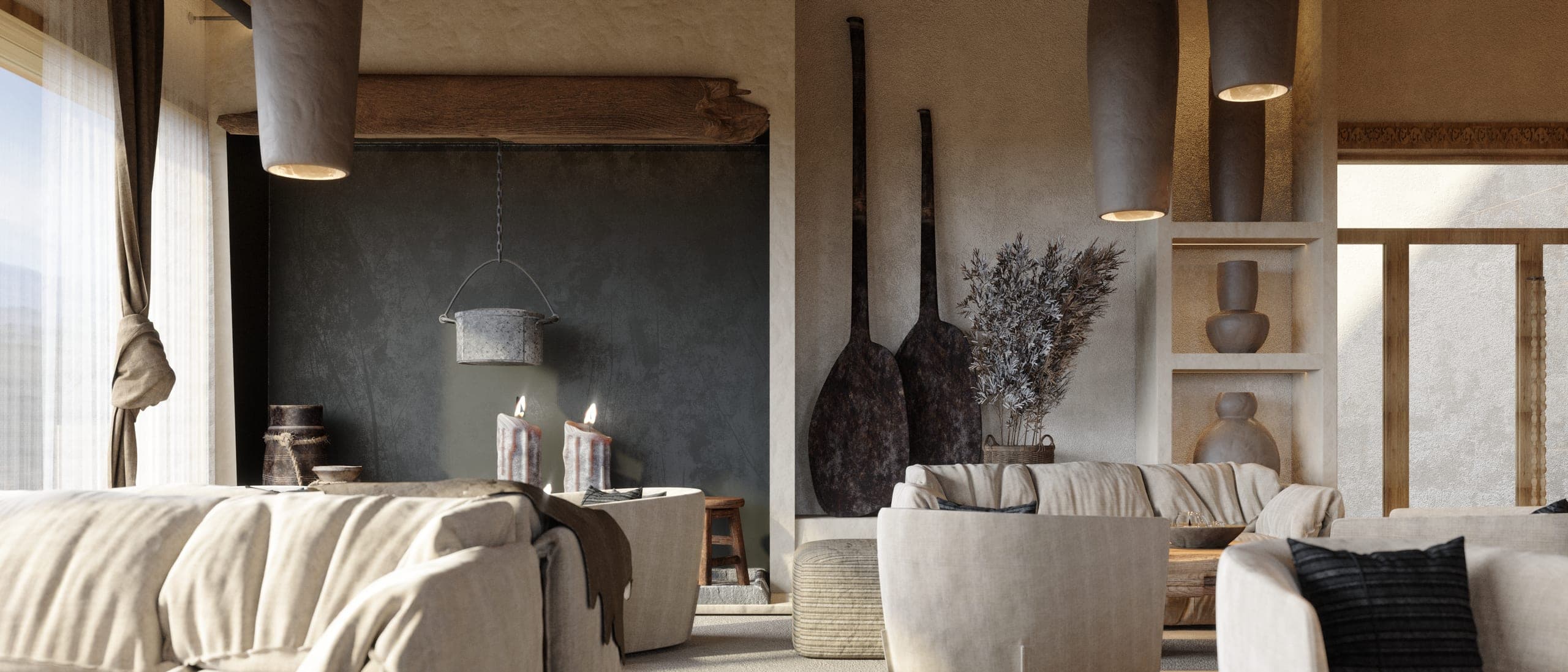 Matca lounge: cream sofas beneath tall dark pendants, with a dark plaster fireplace wall