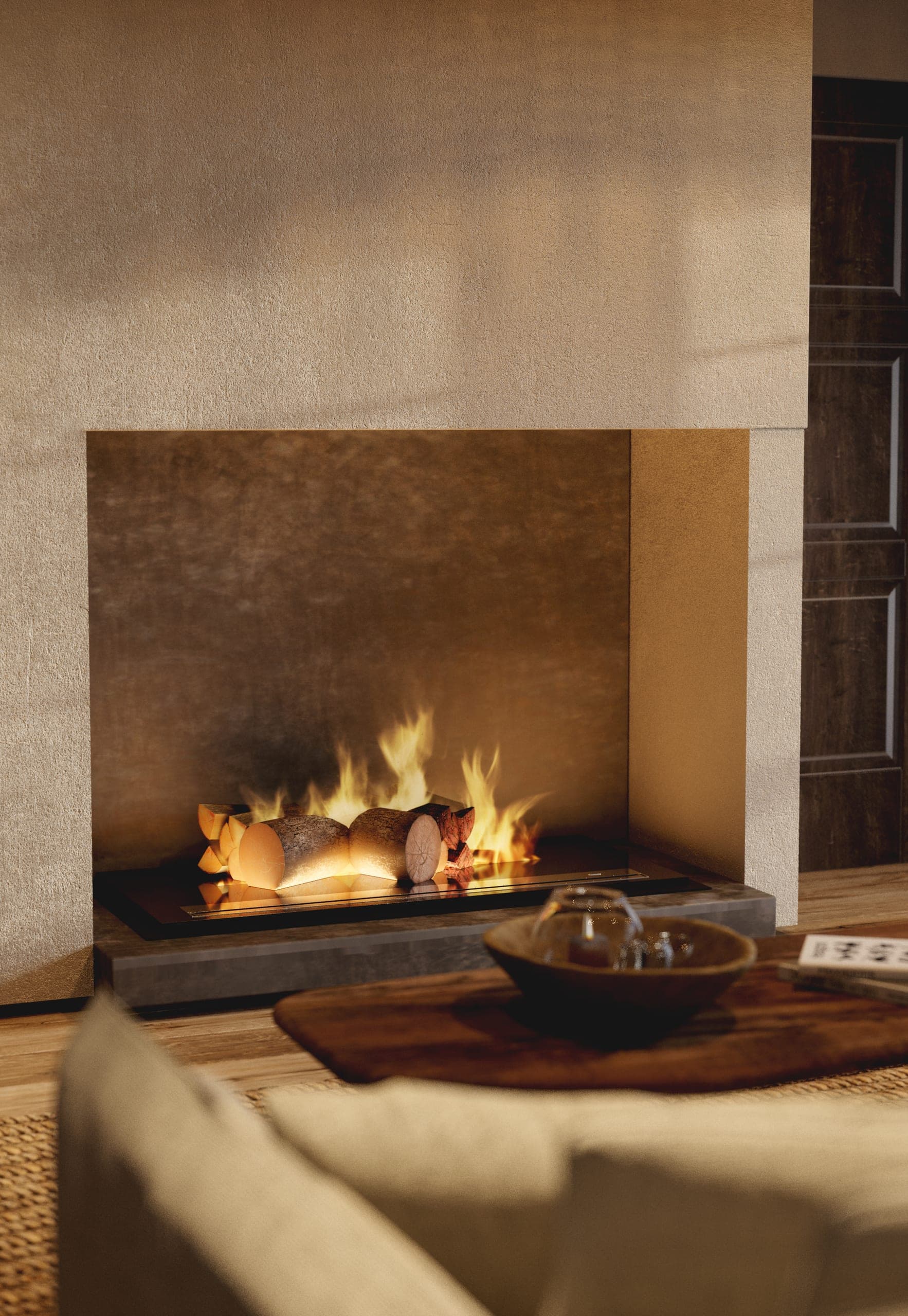 Matca private villa: fireplace set into a plaster wall, low table and sheepskin