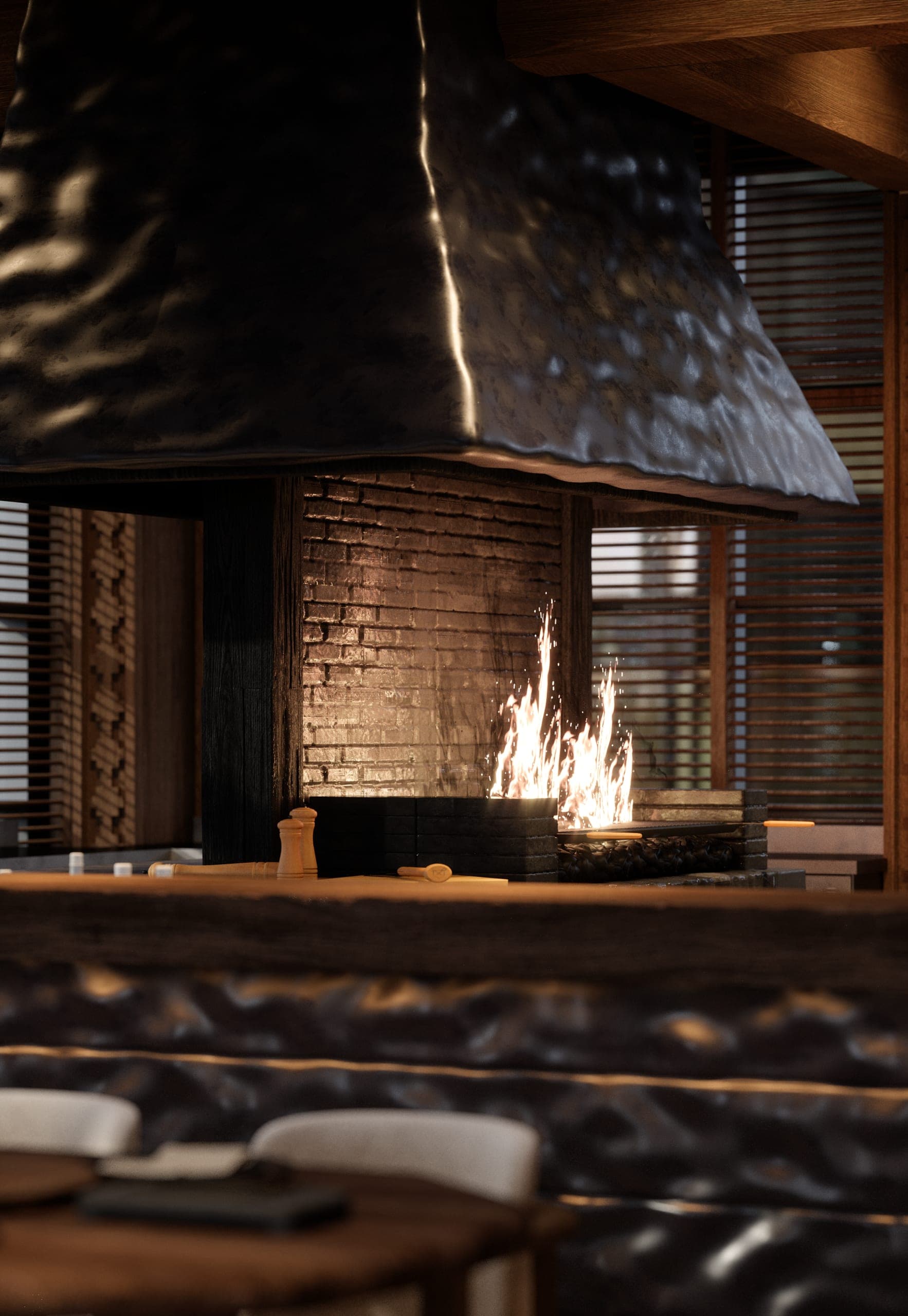 Bamboomat: open fire in the grill beneath a hammered black metal hood