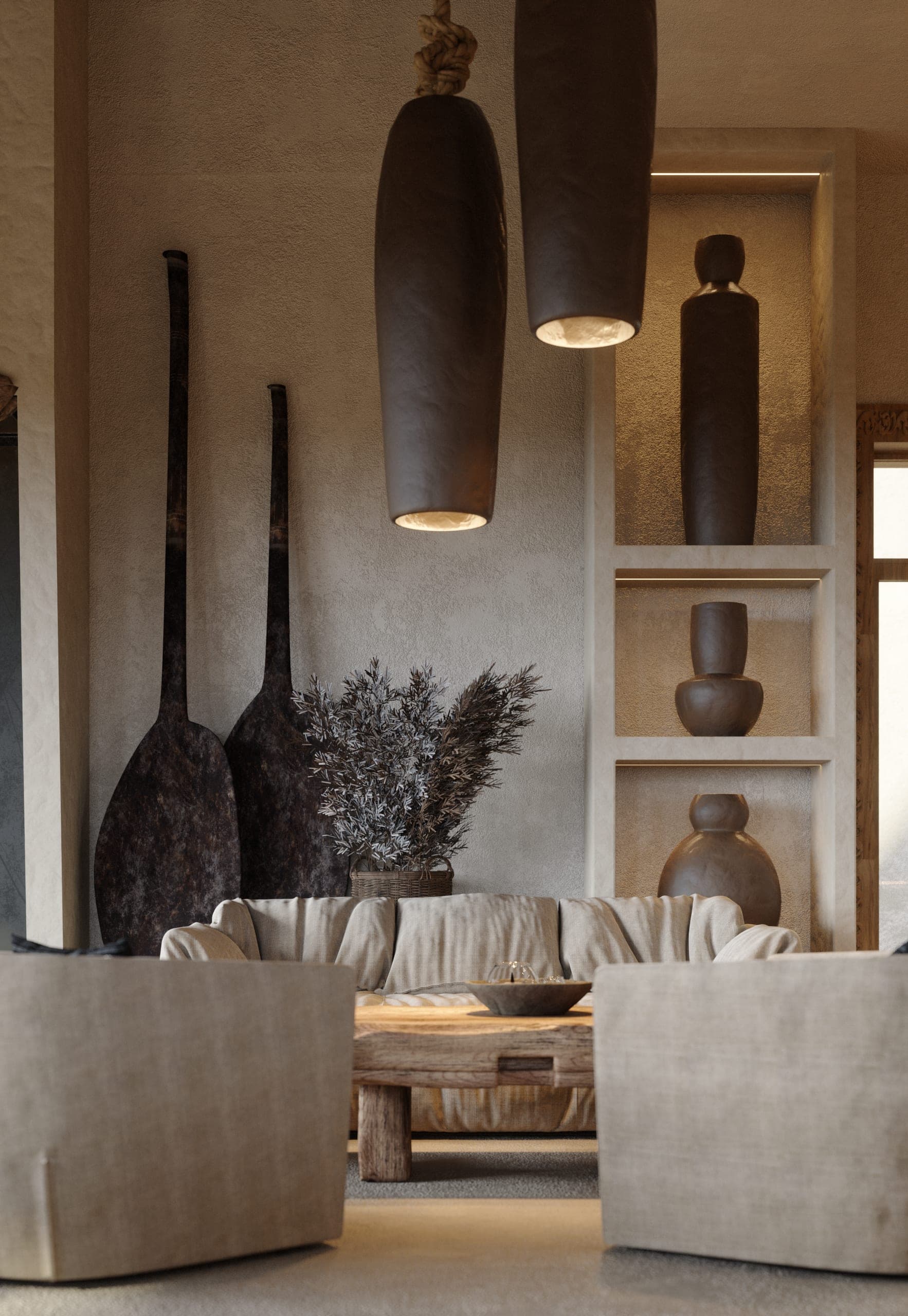 Matca lounge: sofas beneath dark pendants, wooden paddles leaning on the wall