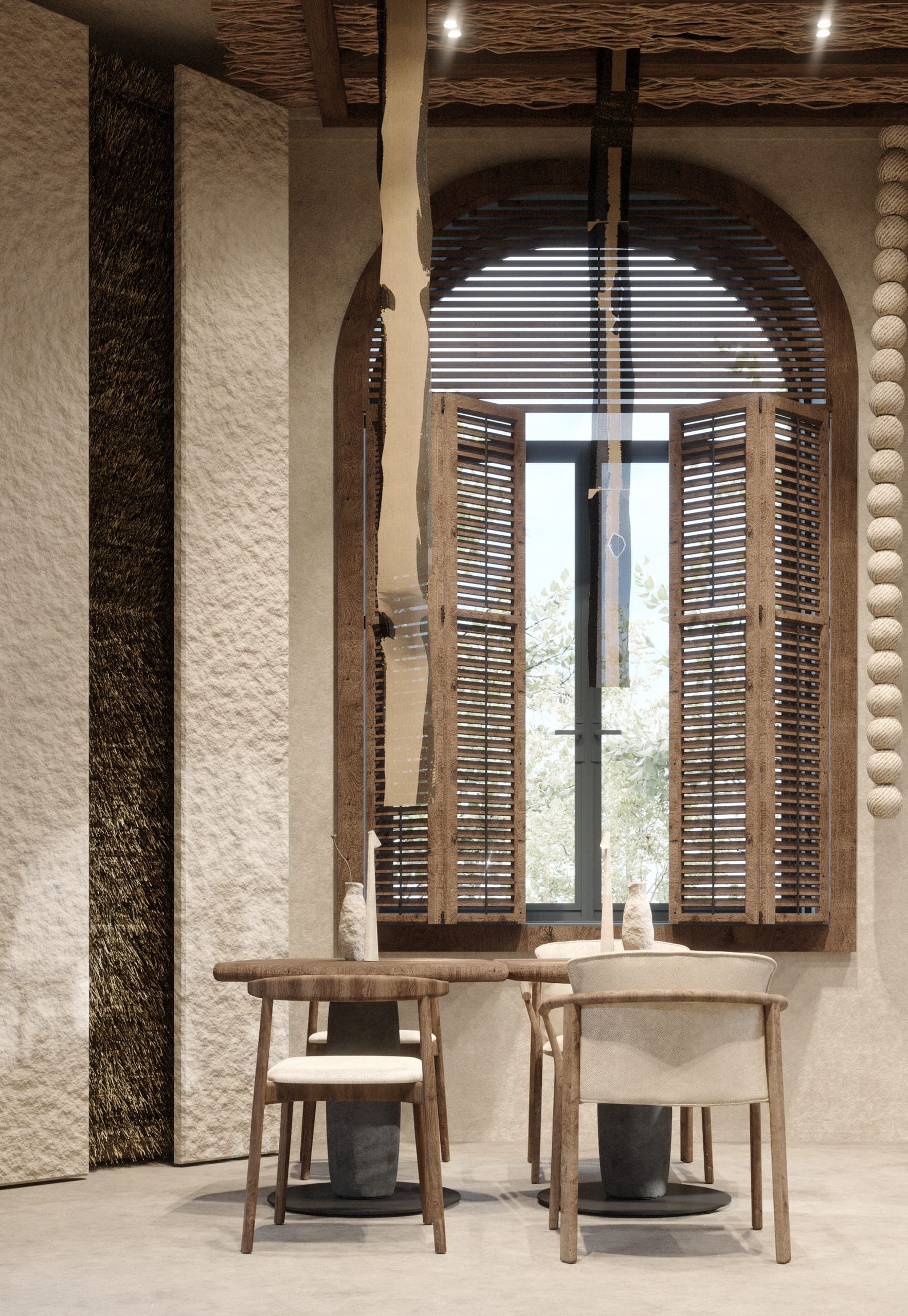 éto: table for two beneath an arched window with timber shutters