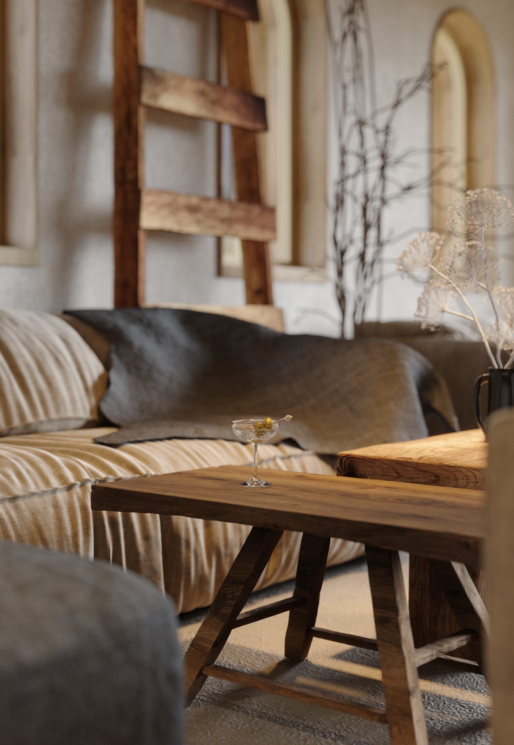 Matca lounge: rustic timber coffee table beside a sofa with a fur throw