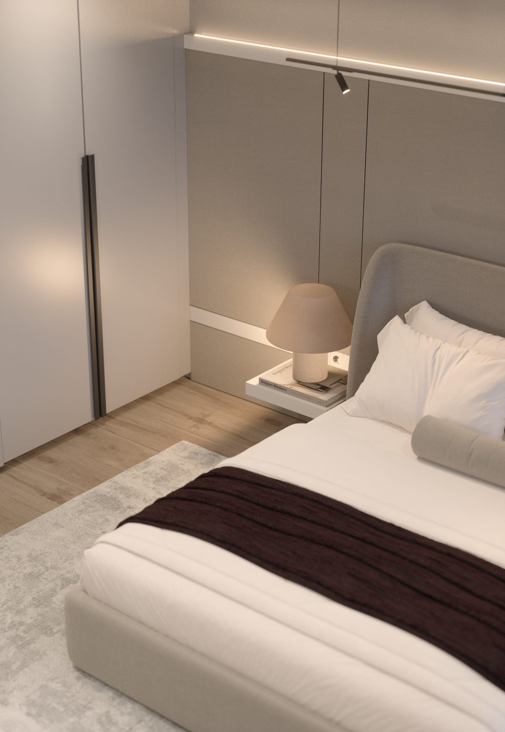 Băneasa House: bedroom corner with an upholstered bed and a bedside lamp