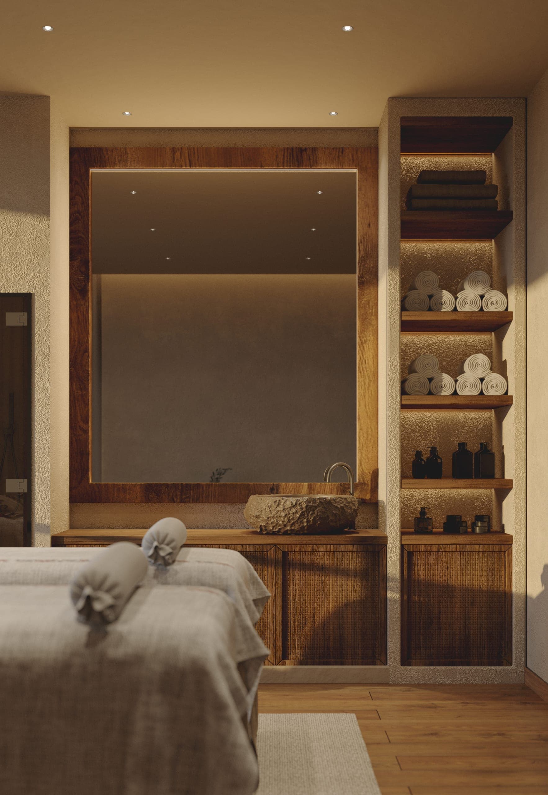 Natura Spa: treatment room with a massage bed and lit shelving