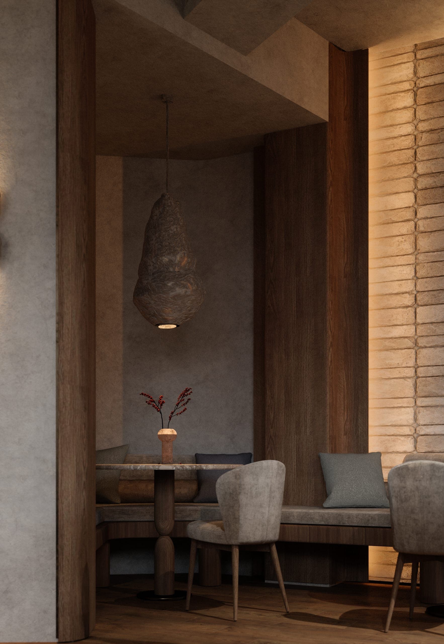 Gran Adamo: corner banquette under a woven pendant, framed by timber panels