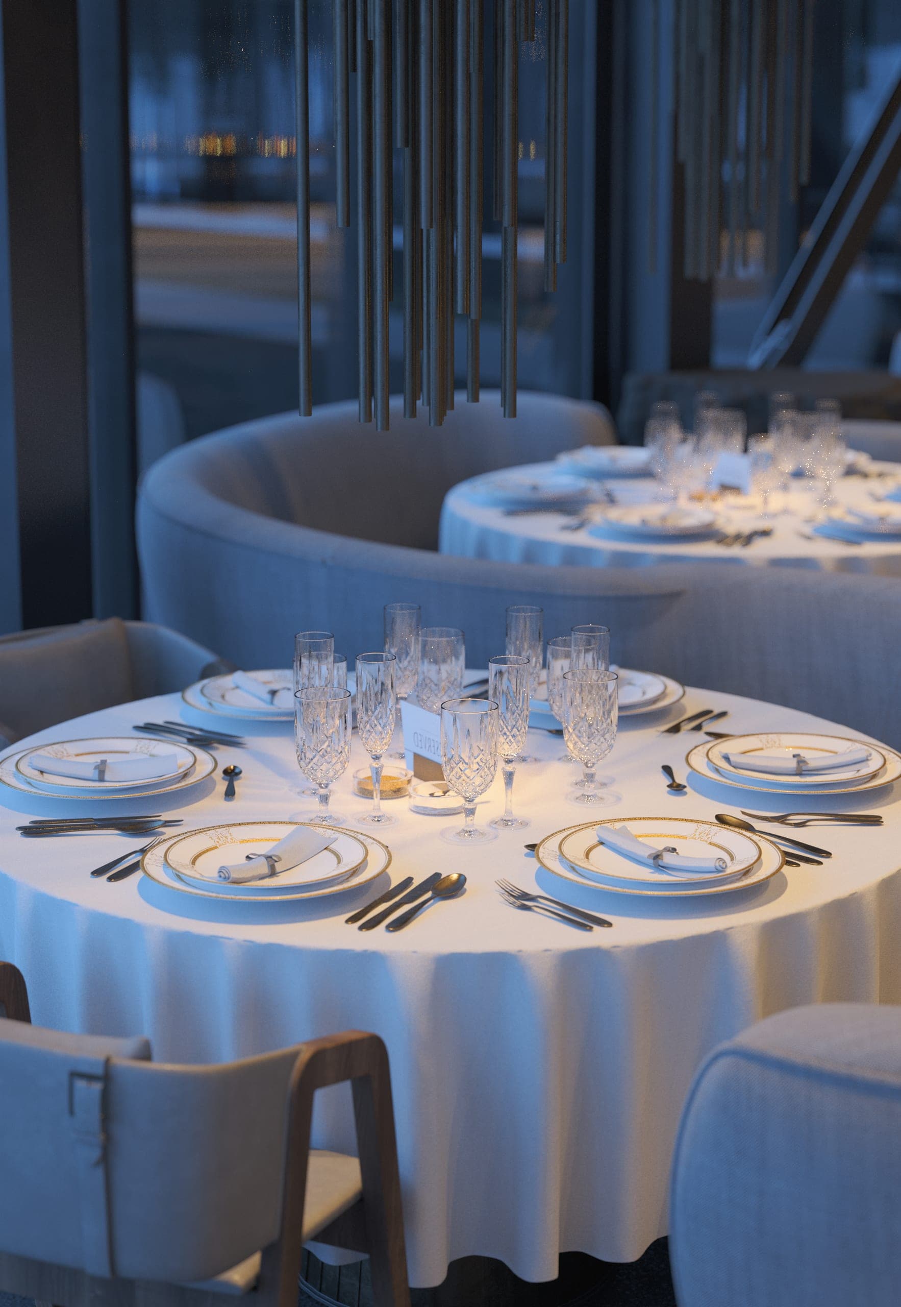 Hotel Peștera restaurant: round tables laid with white linen and crystal