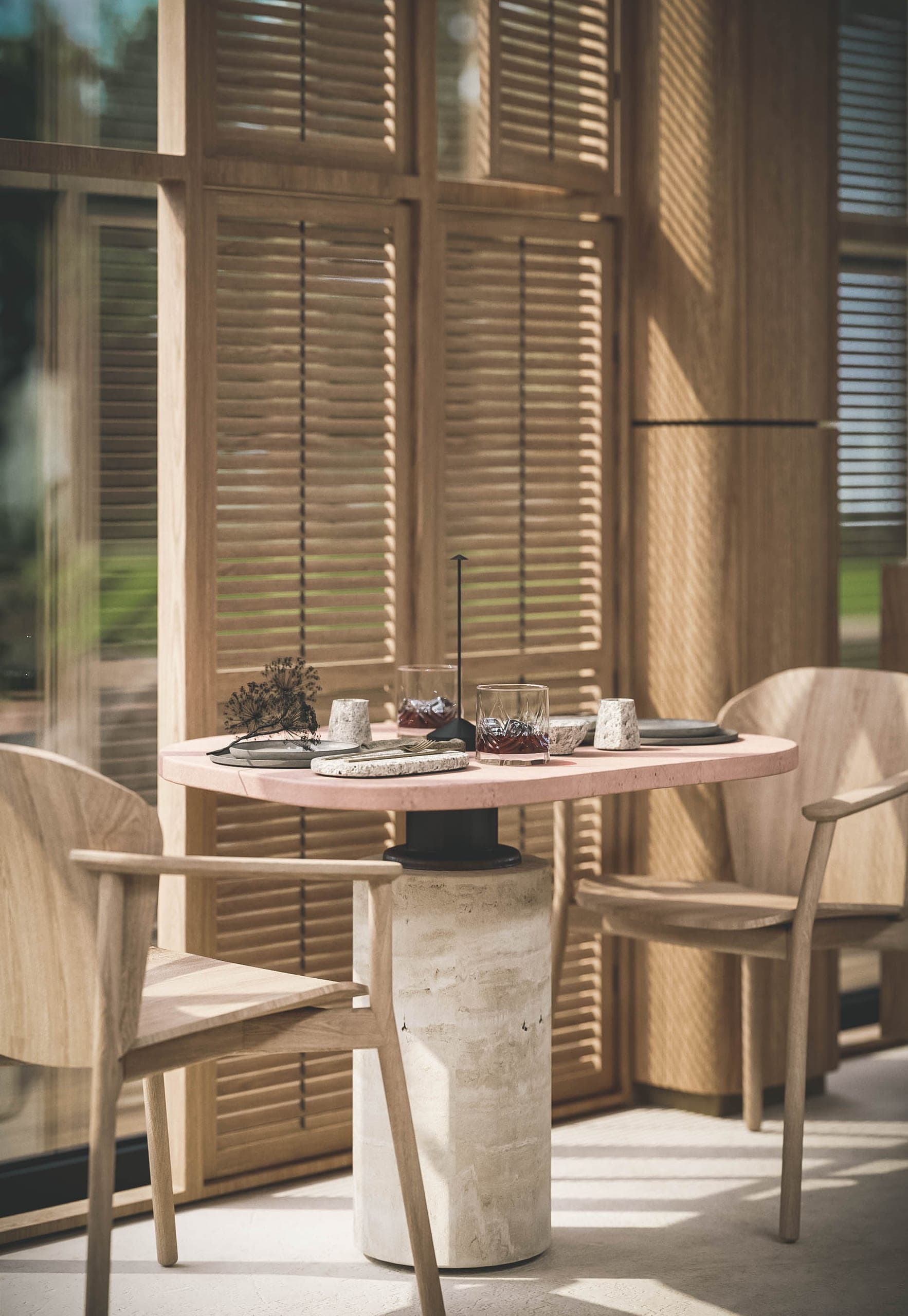 Bosco: laid table by shuttered windows