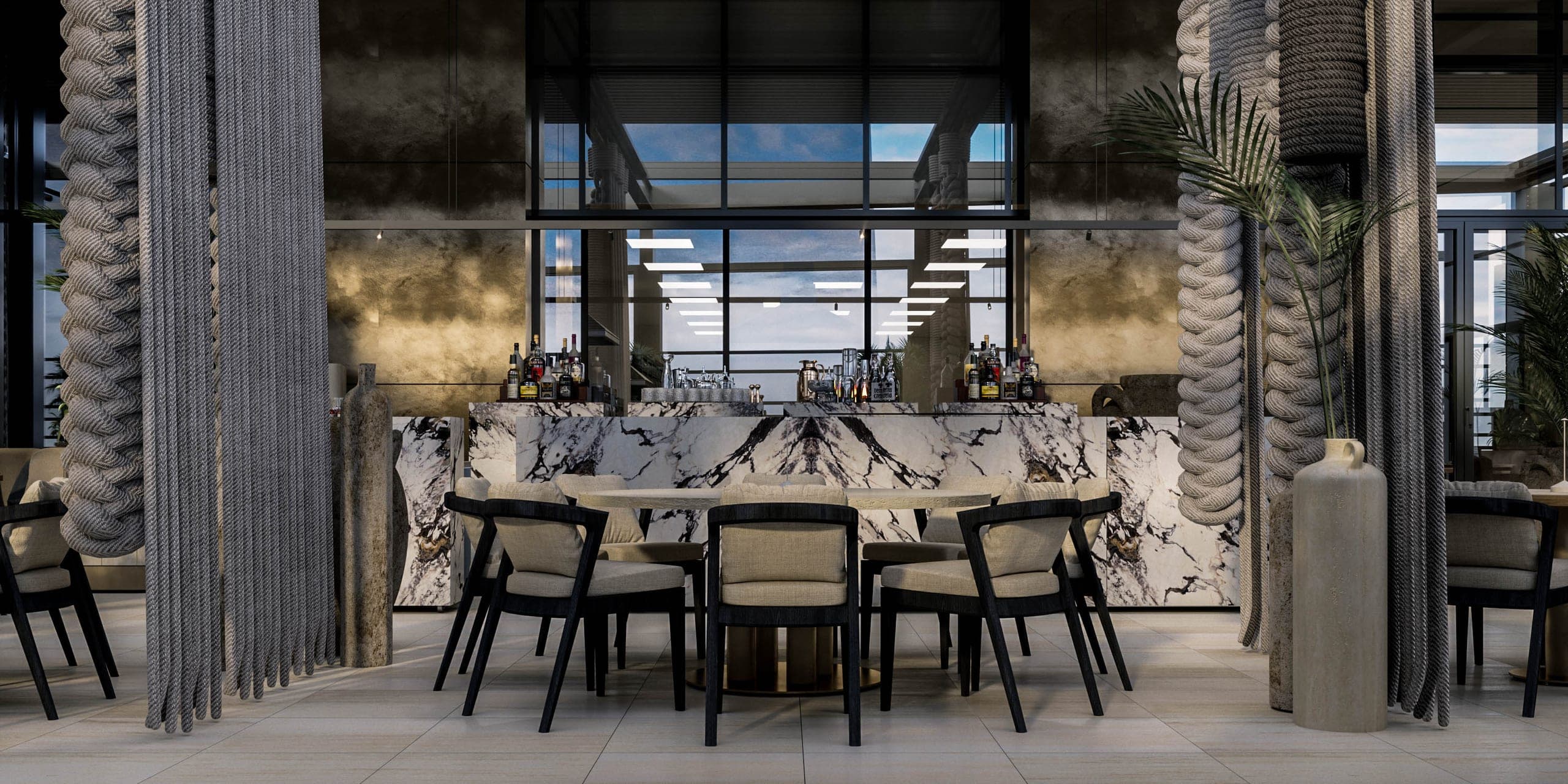 Opera Residence Restaurant: long dining table between rope-wrapped columns with a veined stone bar beyond