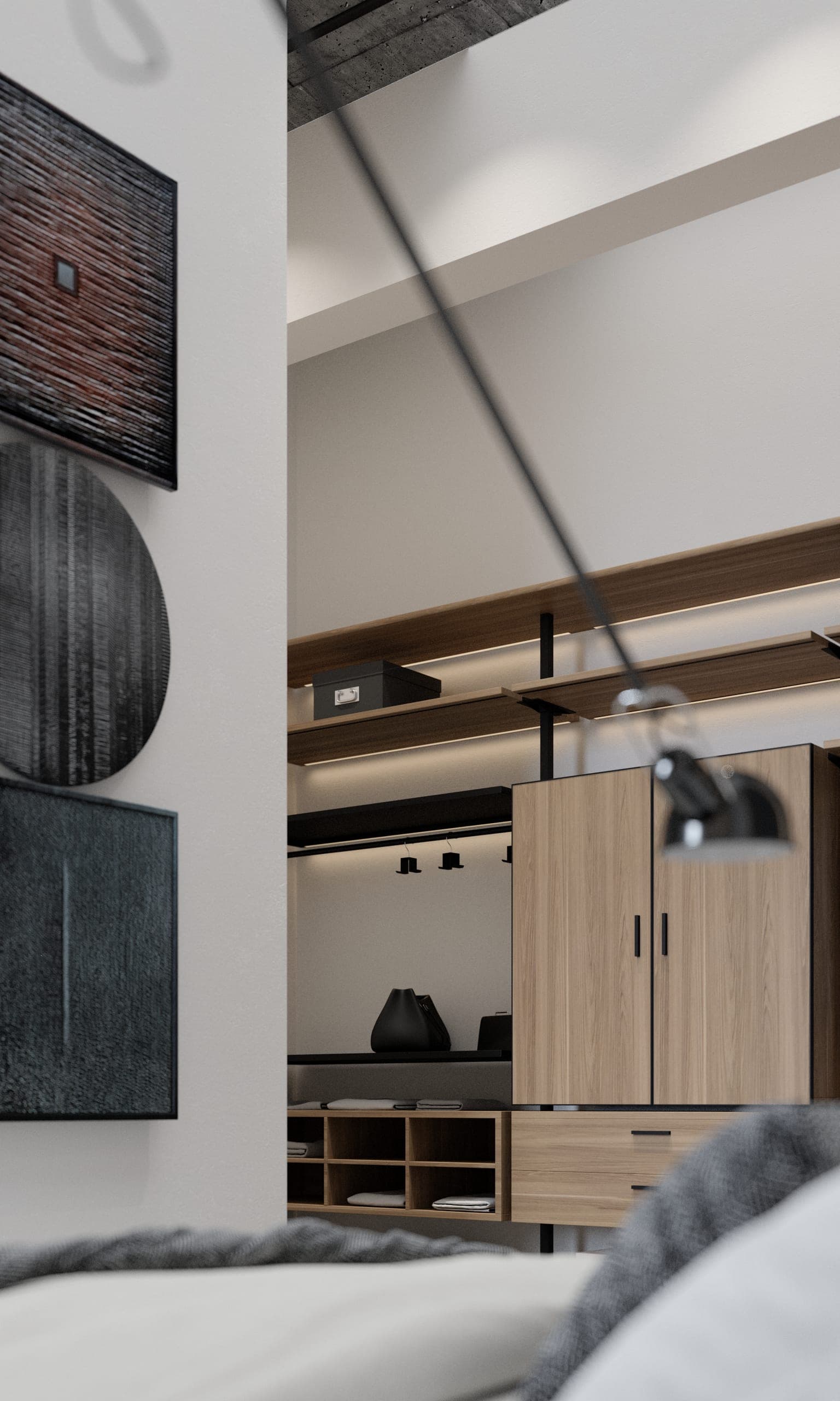 Plauen Apartment: open wardrobe shelving and wall art seen from the bed