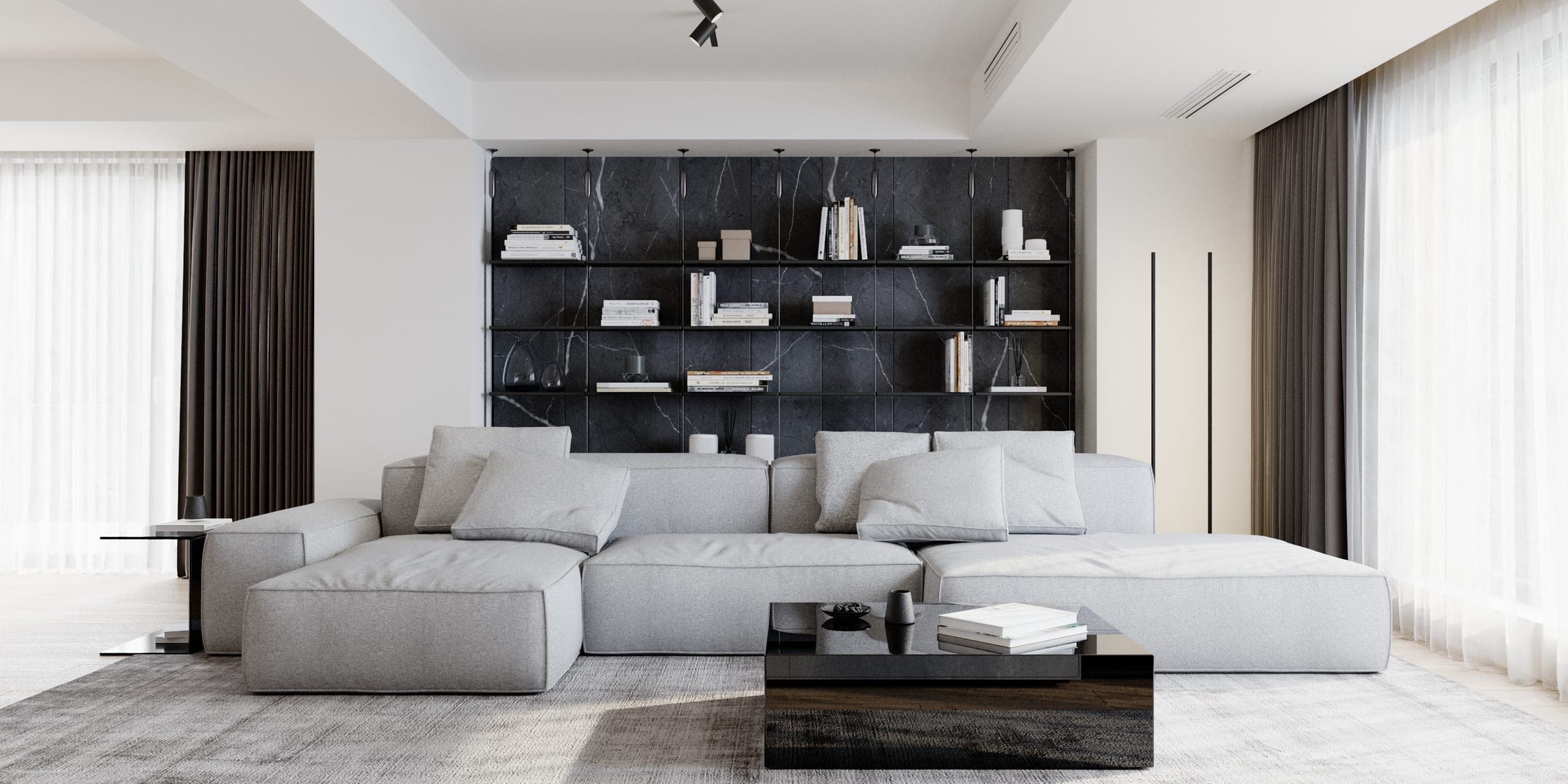 Pitești Apartment: living room with a pale grey modular sofa in front of dark stone shelving