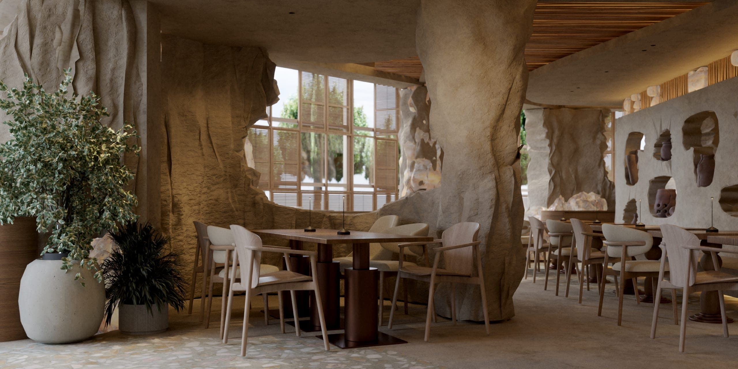 NAMI: dining area between rock-like columns, with tall windows beyond