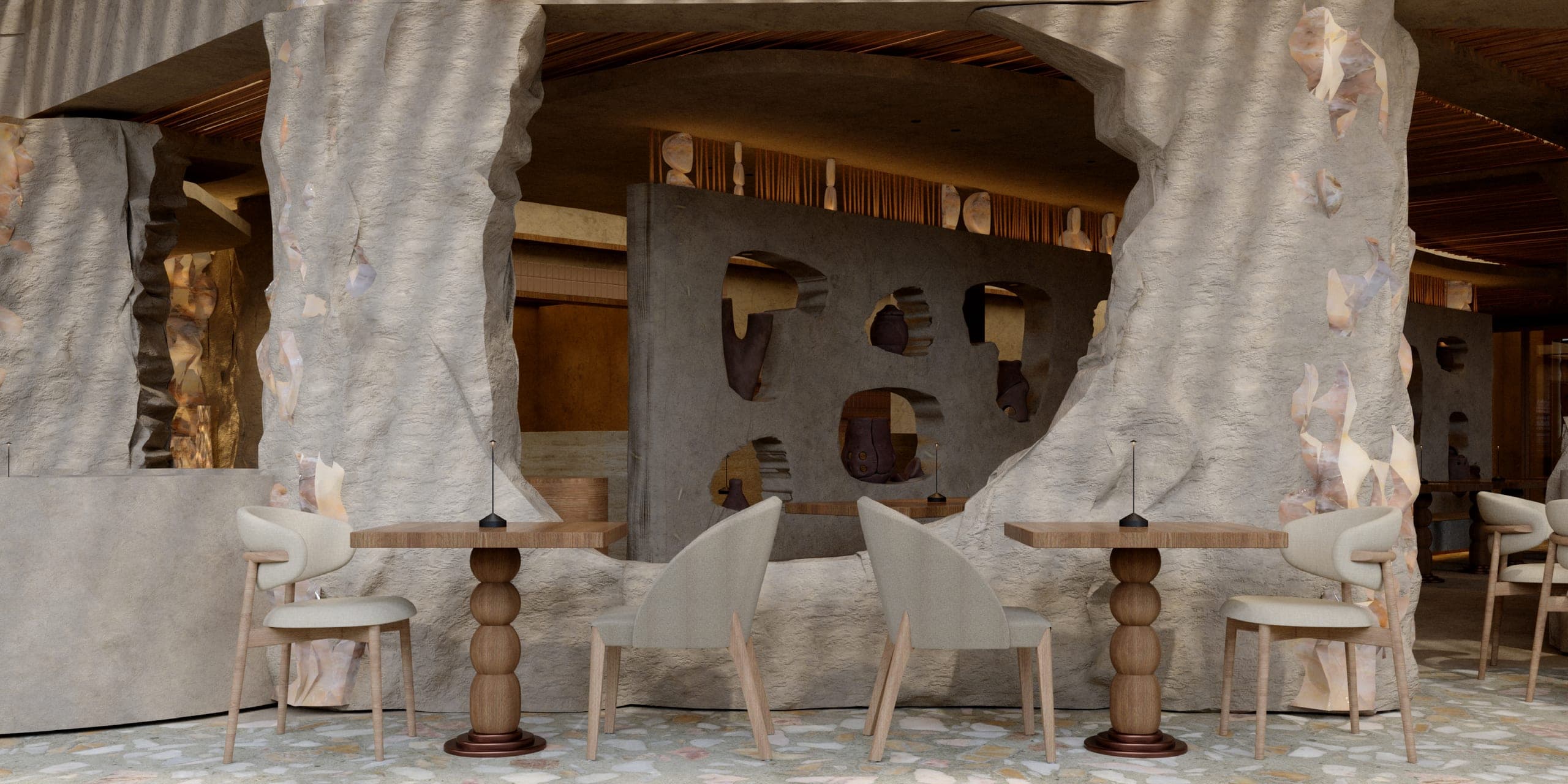 NAMI: tables for two in front of a sculpted wall with irregular openings