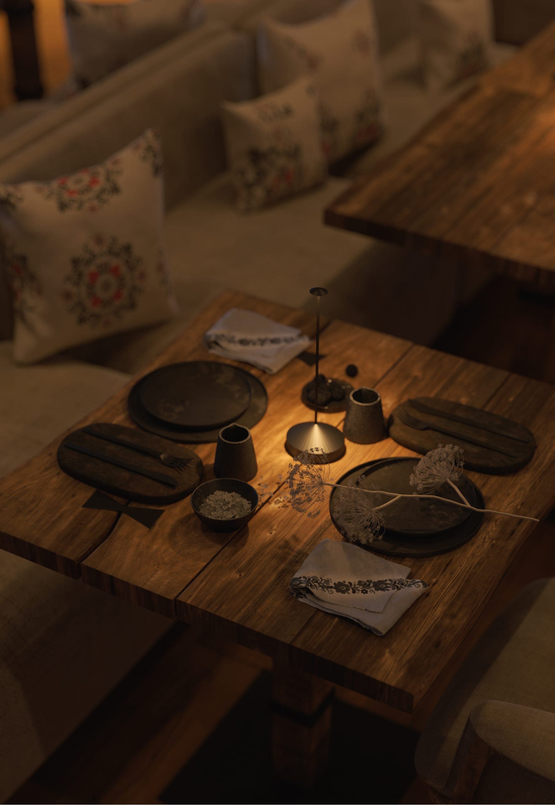 Stup Restaurant in the evening: table set by candlelight, seen from above