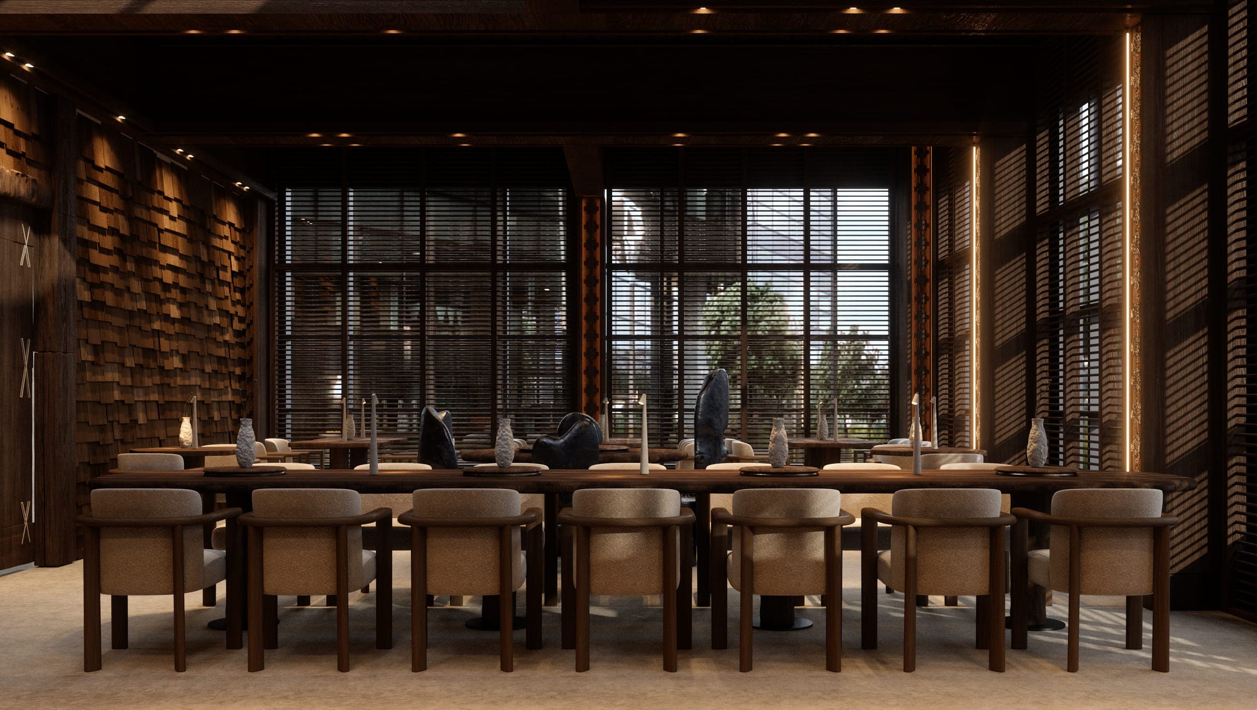 Bamboomat: dining hall with a long communal table, charred timber and shingle-clad walls