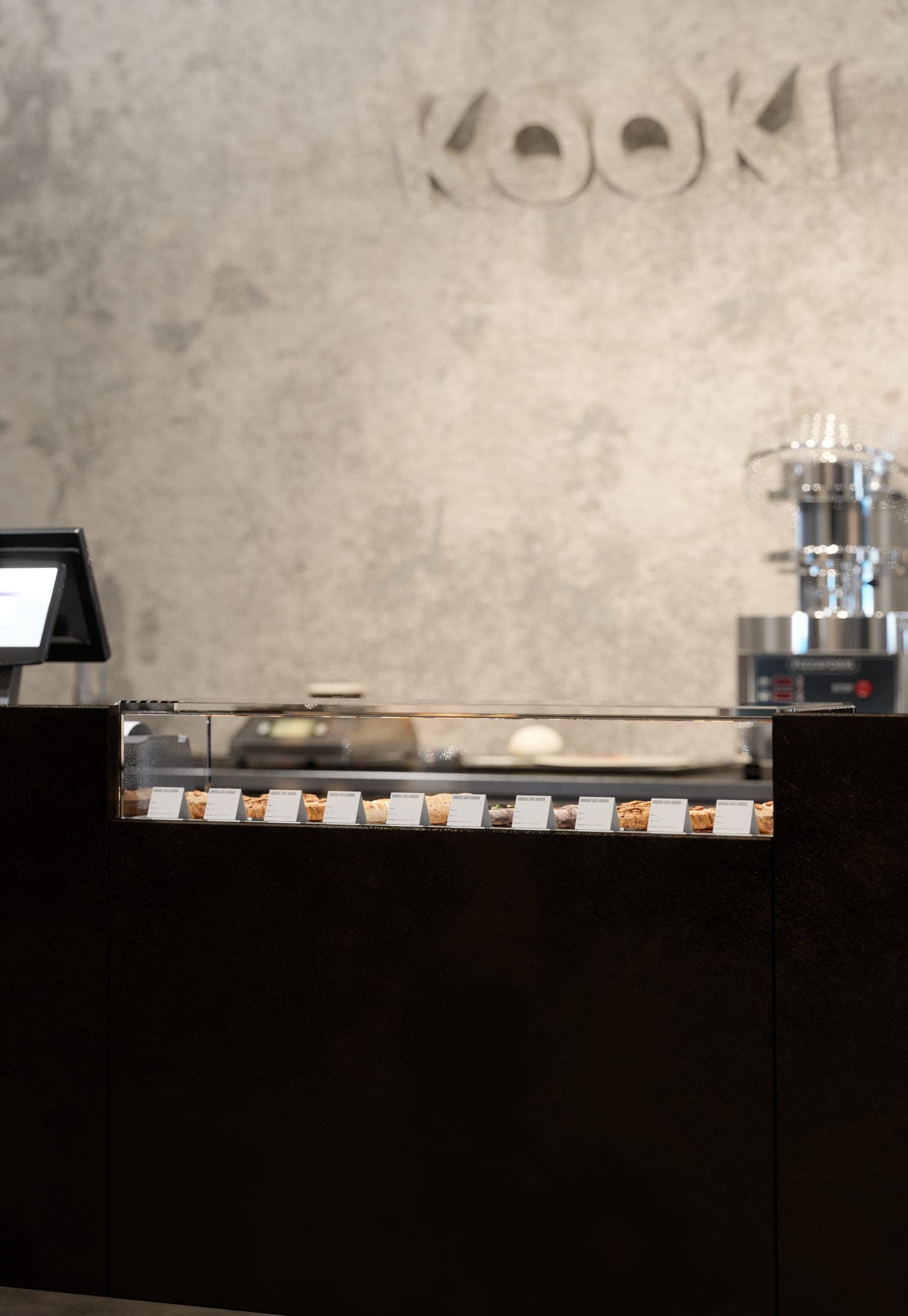 KAVO: pastry display case on the dark counter