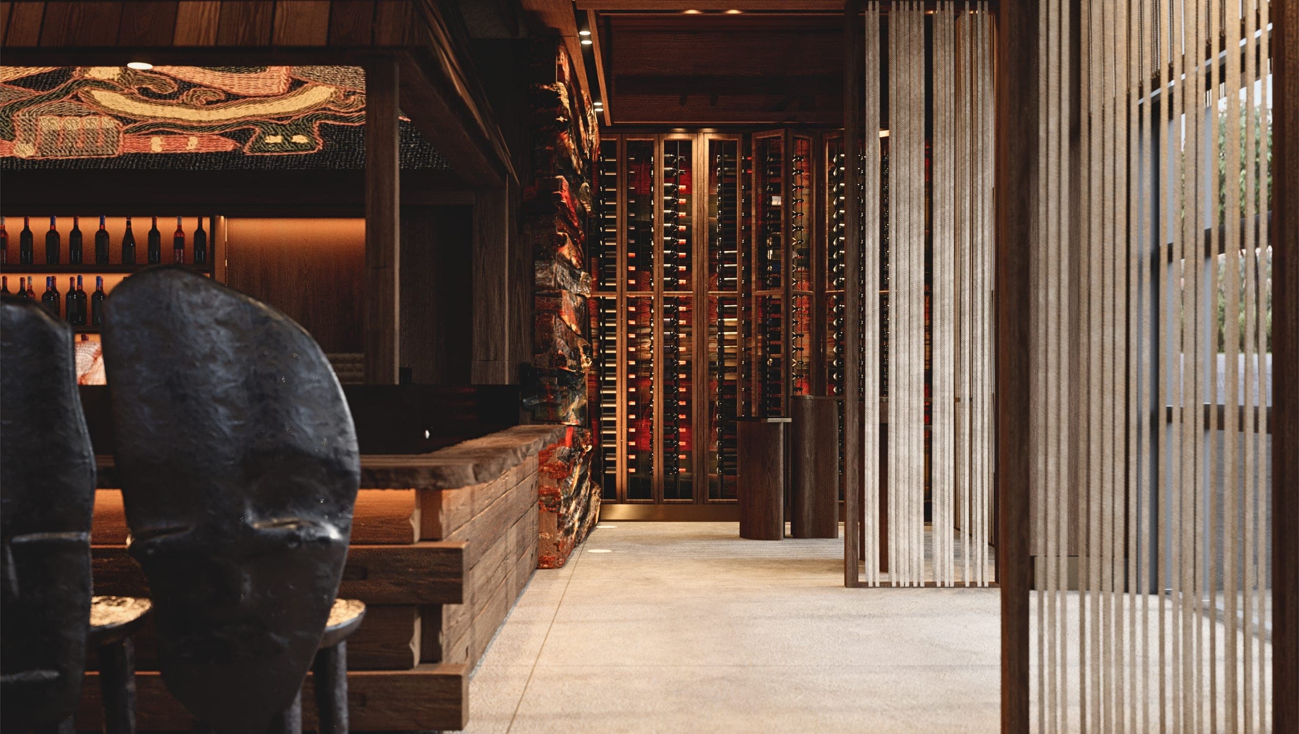 Bamboomat: carved stool at the bar with a view to the wine cellar